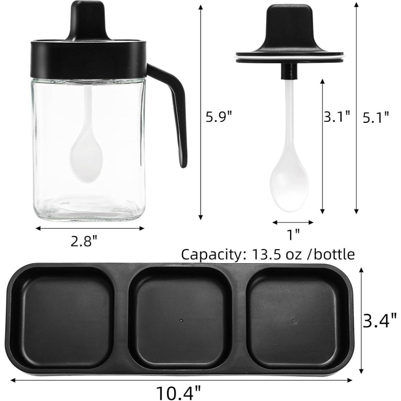 A set of three glass and wooden spice jars, with lids and spoons.