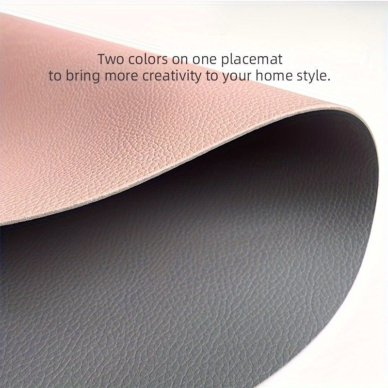 Four-piece set of oval faux leather placemats, reversible, heat resistant.