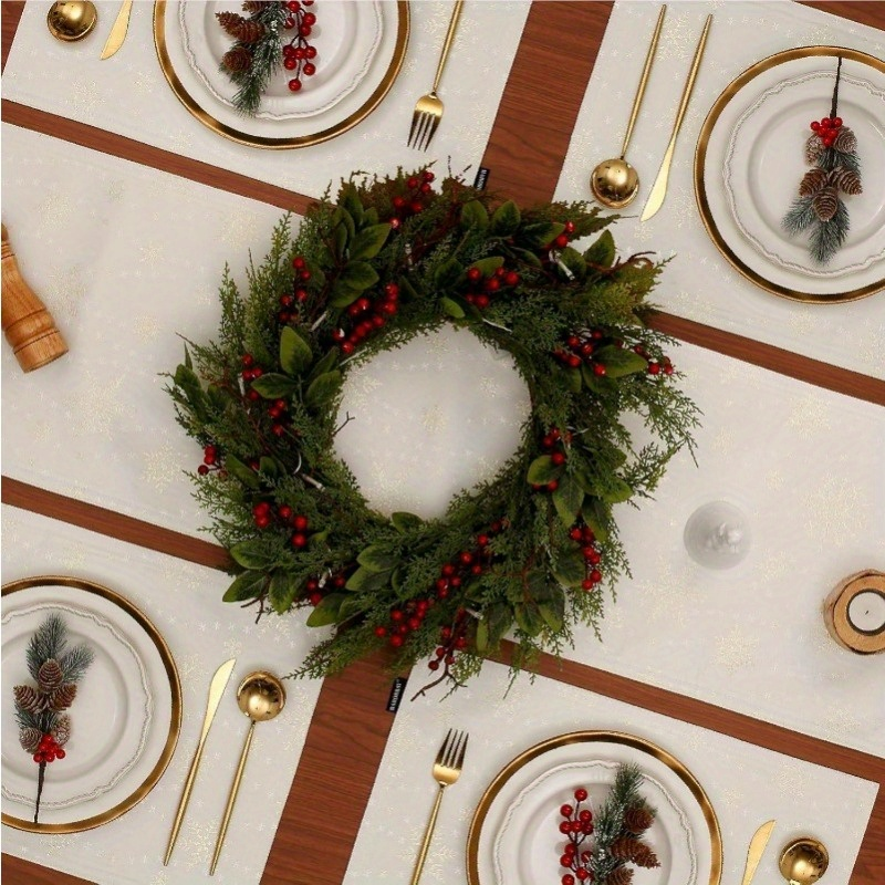 4-piece white placemats with gold snowflake pattern