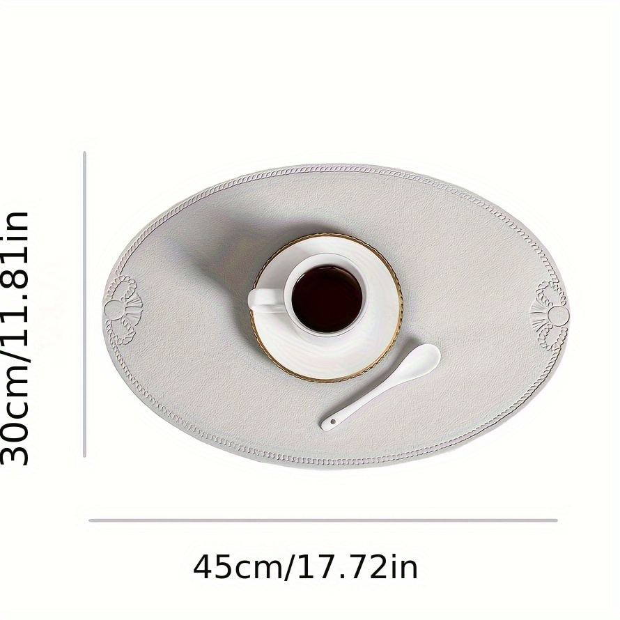 4-piece pack, 30x45 cm, oval embossed placemats, non-slip and durable.