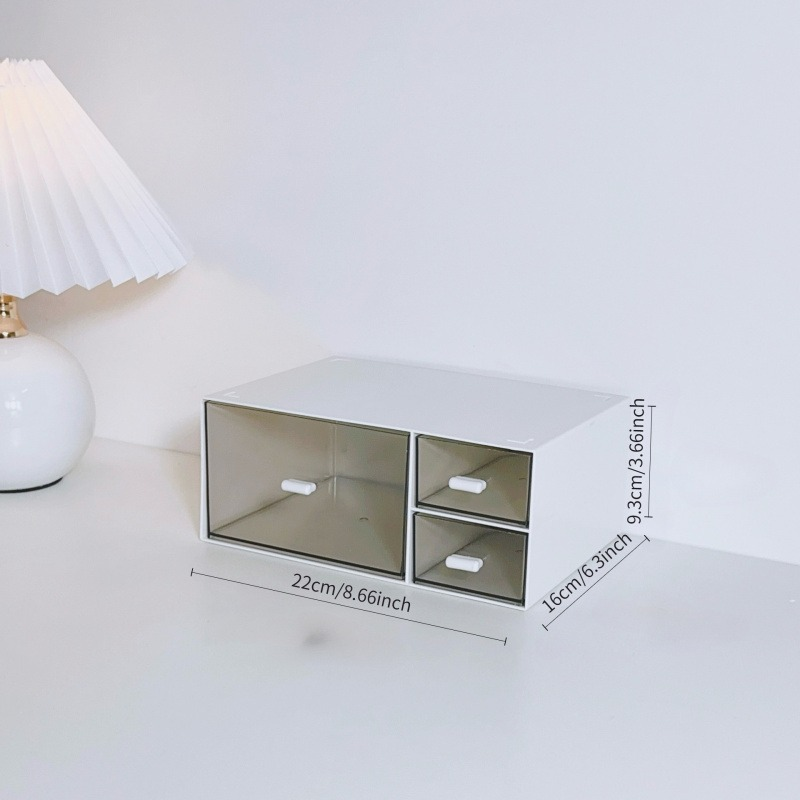 Simple white desktop storage box with transparent drawer design