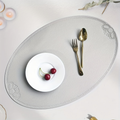 4-piece pack, 30x45 cm, oval embossed placemats, non-slip and durable.